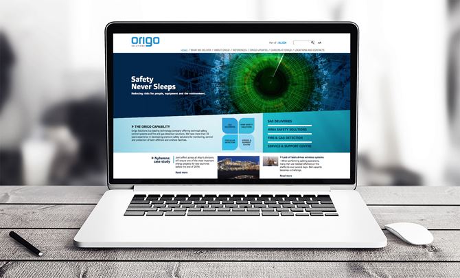 Underselskapet Origo nettside vist på laptop